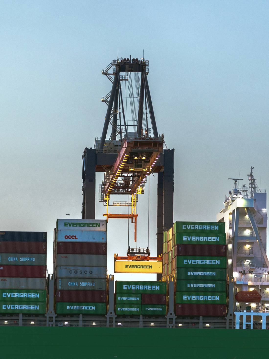 Container crane loading cargo at a shipping port